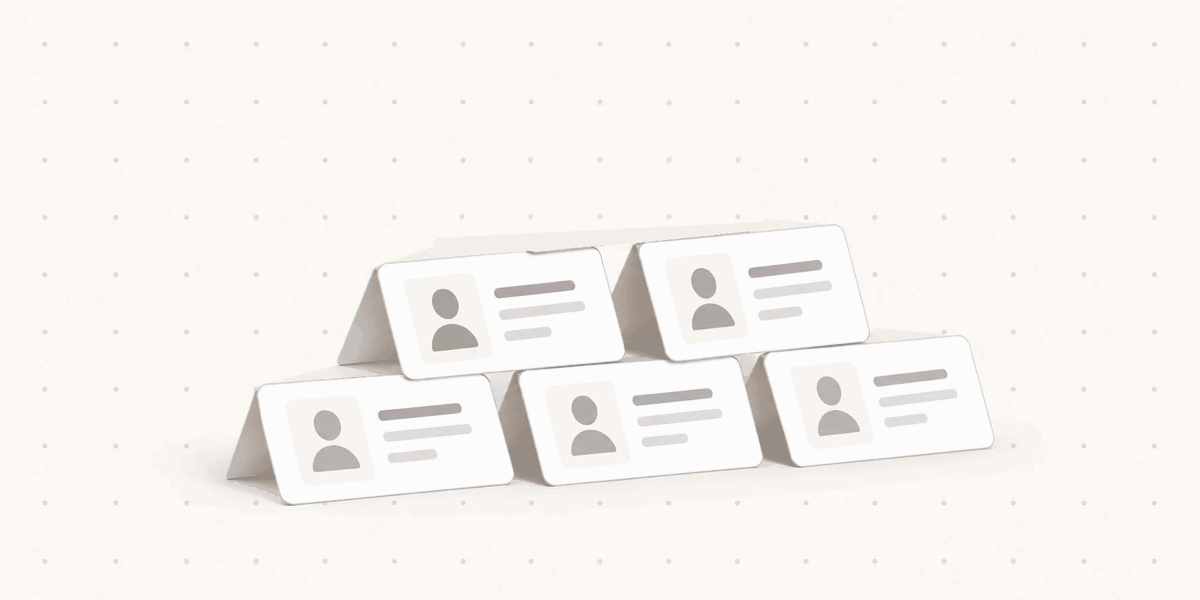 Grey ID cards stack into a pyramid, each row resting on the one below